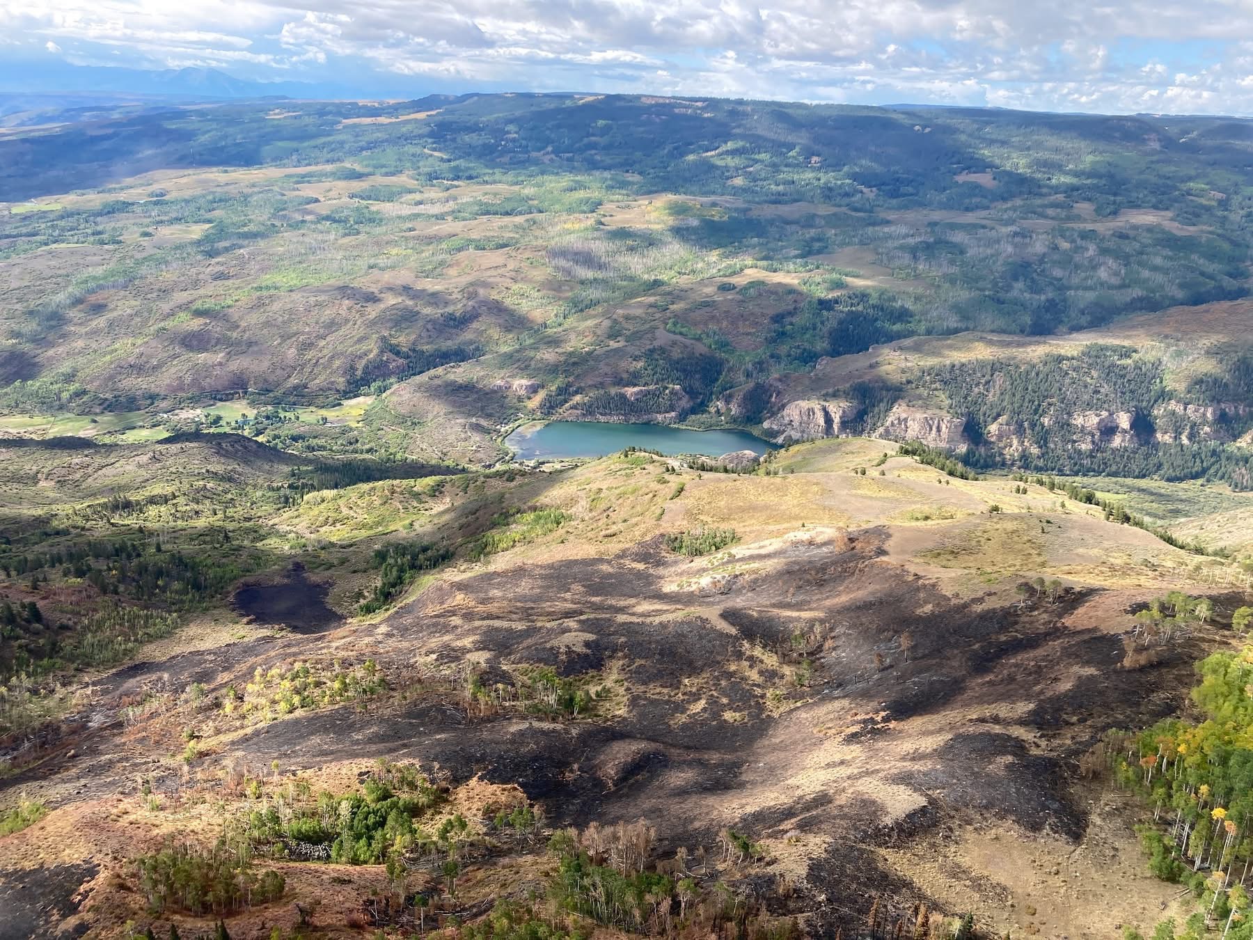 Aerial view of Sweetwater Lake and the terrain affected by the Derby Fire